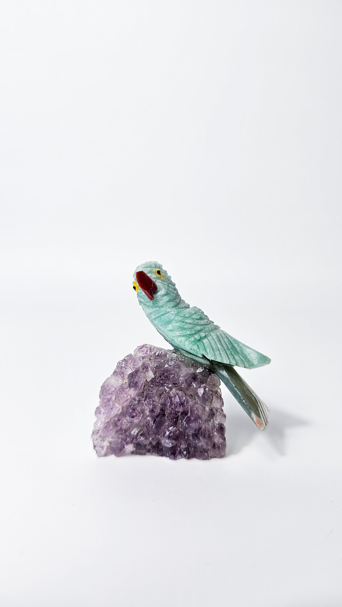 Brazilian Crystal Bird Carving on Amethyst