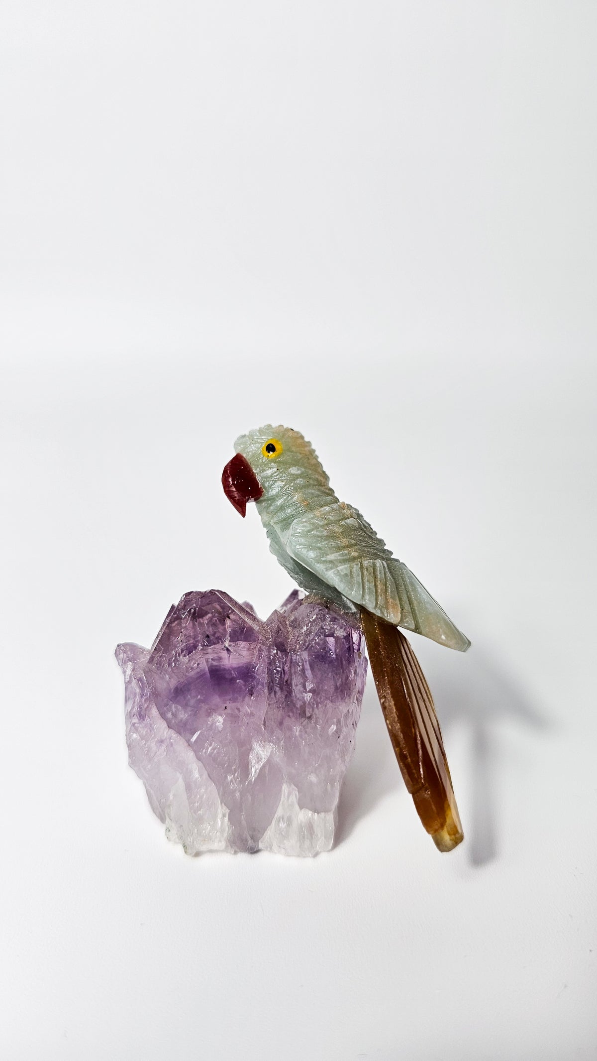 Brazilian Crystal Bird Carving on Amethyst